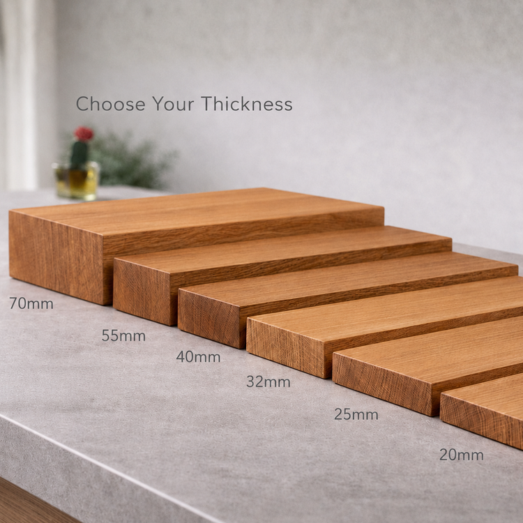 Set of wooden boards with thickness measurements on a gray surface.