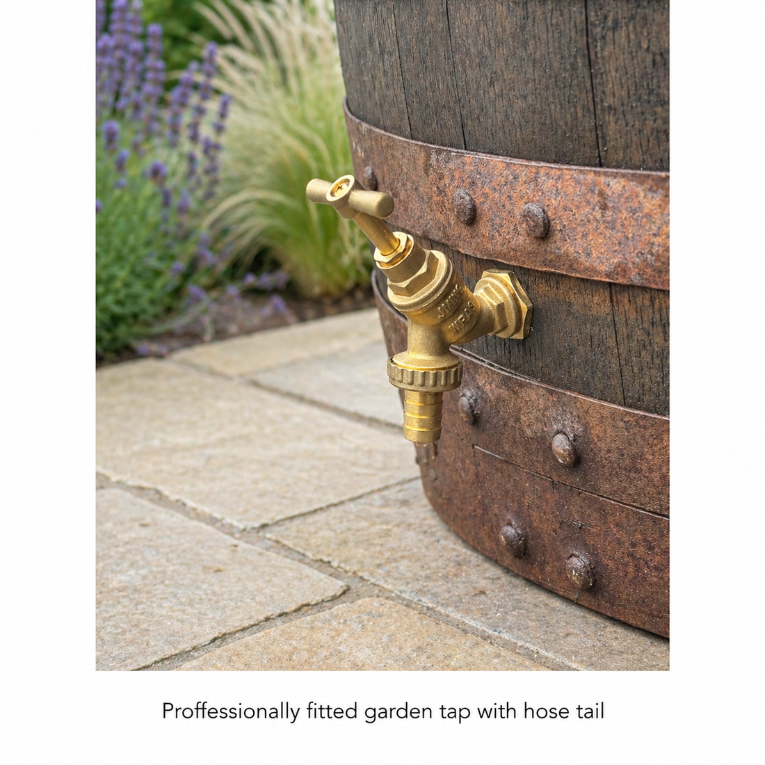 
                      
                        Wooden barrel with a professionally fitted garden tap on a stone patio.
                      
                    